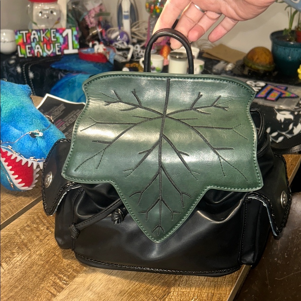 Dolls Kill Black Bucket Bag with Teal Floral Lining